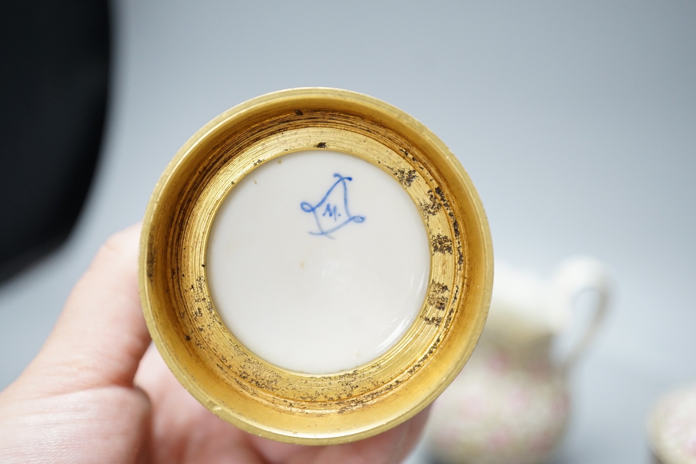 A Vienna porcelain small spittoon, early 19th century, a Sevres style jug, sucrier and pot and a Rudolstadt dish